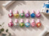water-based, non-toxic kids' nail polish set featuring 3D character charms on star-shaped bottles.